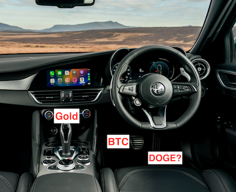 The dashboard and pedals of a recent Alfa Romeo with a view of plains through the windscreen.  The gear stick in parked is labelled 'Gold', the break pedal is labelled 'BTC' and the accelerator/gas pedal is labelled 'DOGE?'